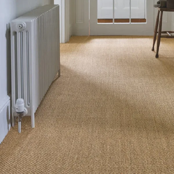 beige sisal carpet with a tight, basket-weave texture
