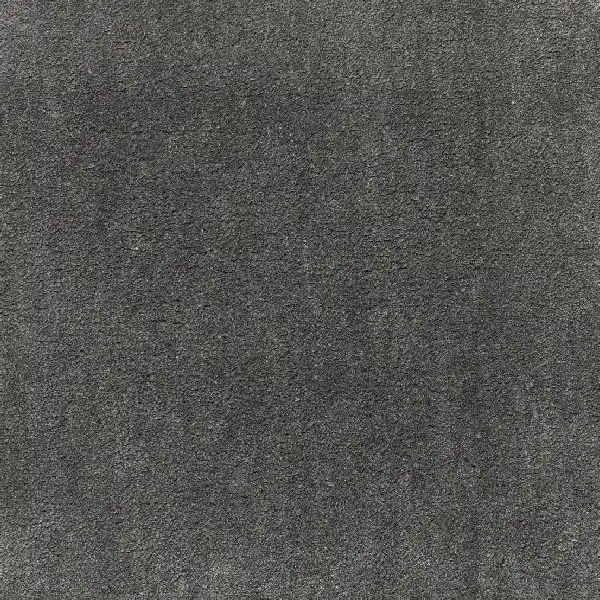 Dark charcoal gray silk carpet texture.