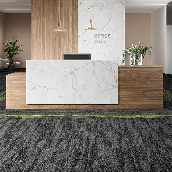 Gray and black patterned carpet in a office reception area.