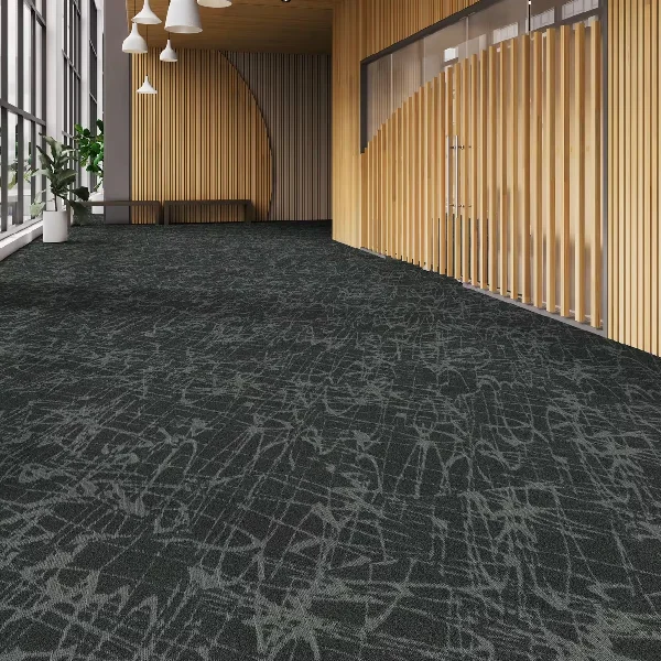 Large room with patterned black and grey carpet