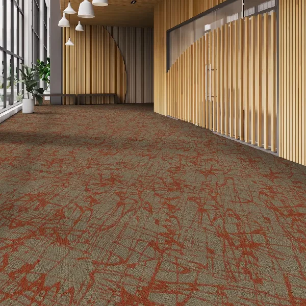 reddish-orange abstract pattern on a tan background in a commercial hall.
